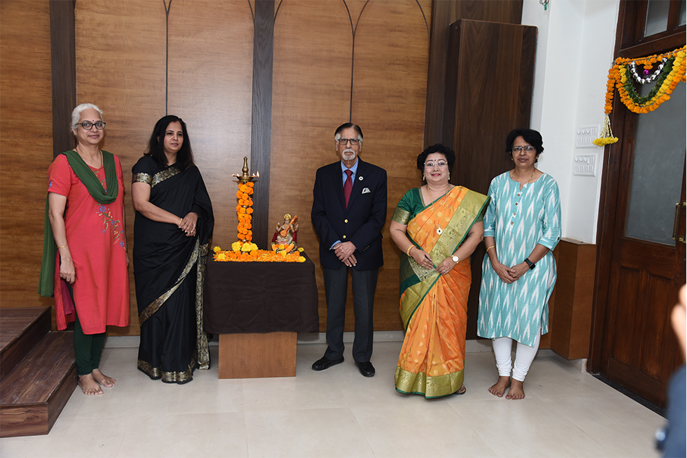 Eminent Guests lighting the ceremonial lamp along with the Principal Dr. Kavita Lalchandani